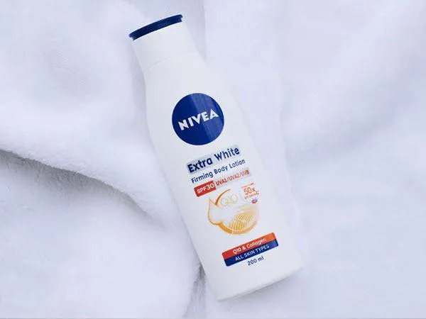 Kem dưỡng trắng da toàn thân Nivea Extra White Firming Body Lotion SPF30 PA++